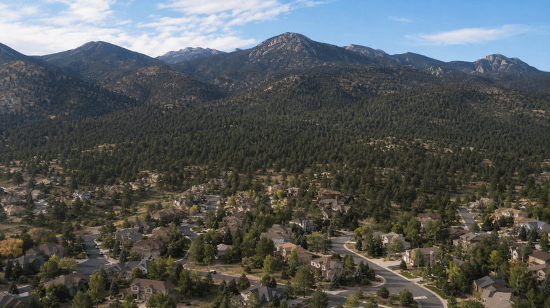 Colorado Springs neighborhoods bordering the forested foothills of Pike National Forest.