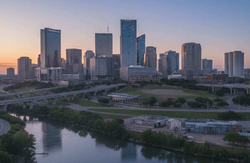 An image of the Fort Worth skyline at sunrise; check the live air quality index (AQI) map for Fort Worth, Texas today.
