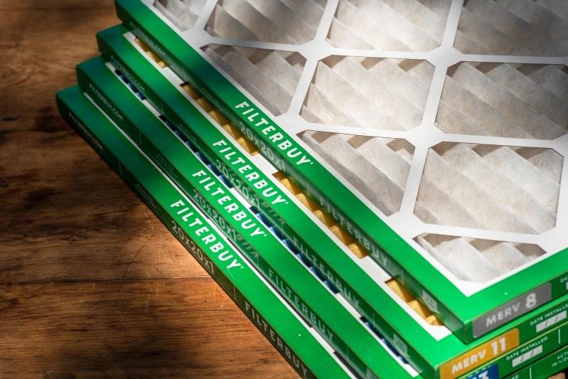 The Best Alternaative for Reusable & Washable HVAC Furnace Air Filters - Image of stacked Filterbuy air filters with various MERV ratings ready for installation in a home.