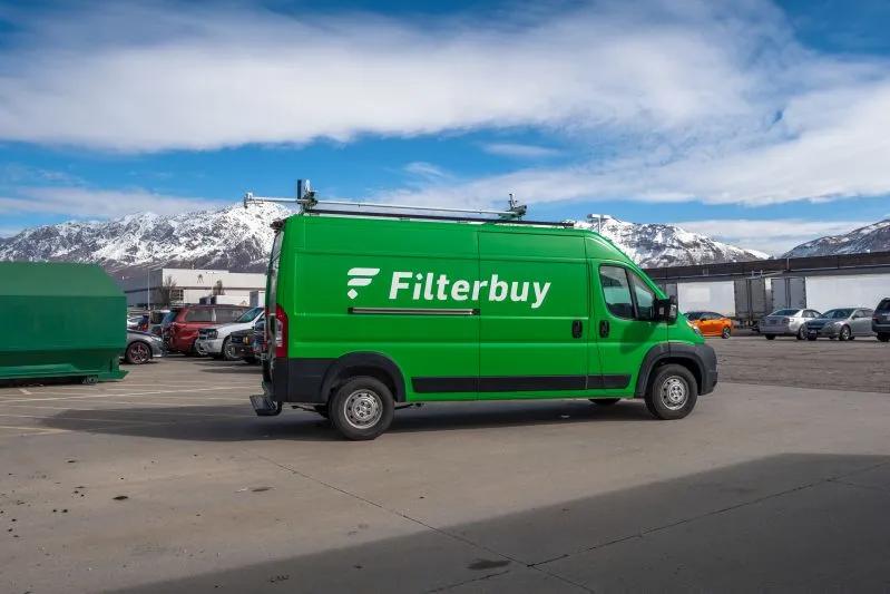View of Filterbuy truck parked outdoors with a view