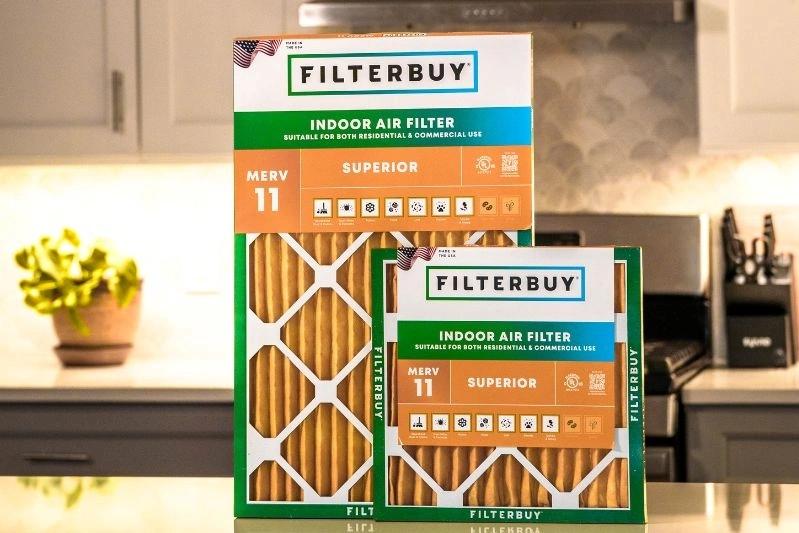 How to Clean Metal Mesh Air Conditioning Filter the Right Way - An image of MERV 11 Superior Filter in orange color, shot in the kitchen.