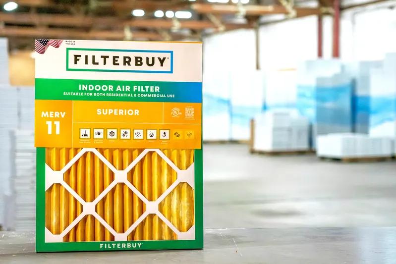  A view of a premium 18x18x4 air filter standing in a warehouse, showcasing its superior build quality and filtration performance for cleaner, healthier indoor air.