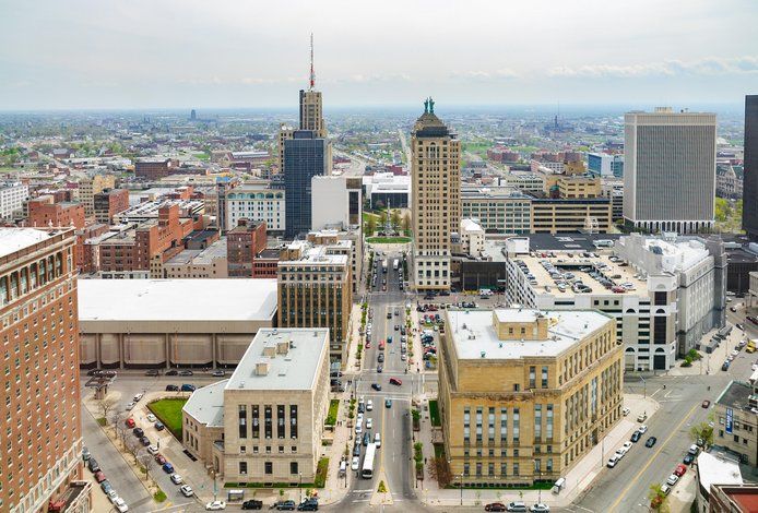 The Least Internet-Connected Cities - Infographics of Downtown Indianapolis skyline—an example of a midsize metro with growing but unequal internet connectivity.