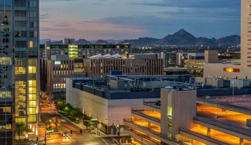 Cities with the Most Asthma Cases - Image of Phoenix city skyline with  modern skyscrapers, capturing a vibrant view of the city at sunset.