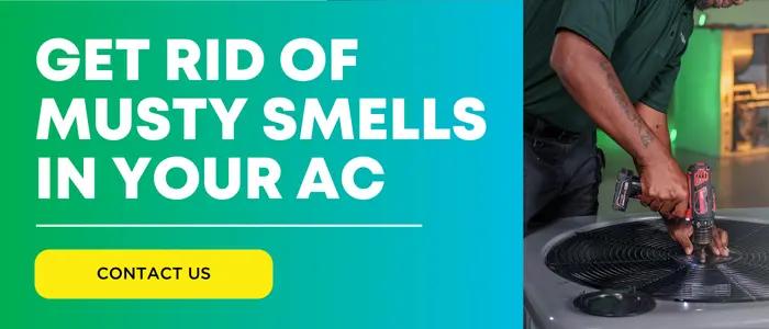 Fix musty AC smell - HVAC technician servicing unit