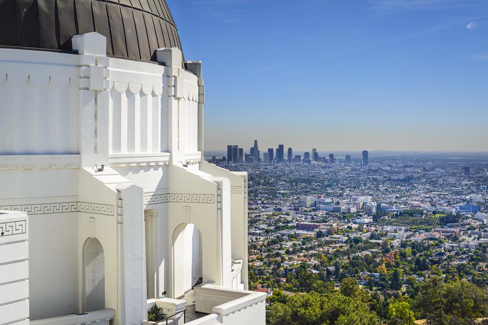 Griffith Observatory overlooking Los Angeles skyline on a clear day in Southern California.
