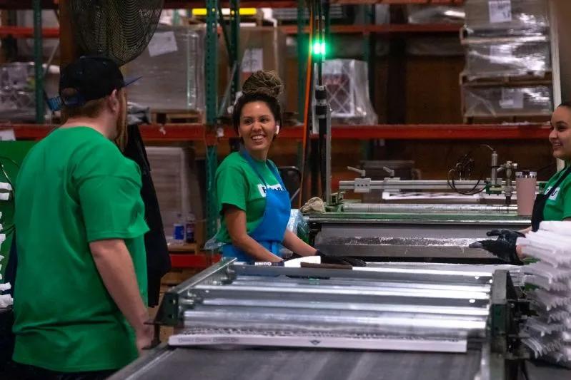23.5x25x2 HEPA Air Filter For Allergies - View of Filterbuy employees happily working inside a company facility