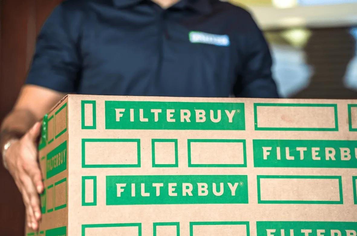 Image of Filterbuy box being delivered, representing fast shipping and trusted service for industrial bag and pocket air filter replacements.
