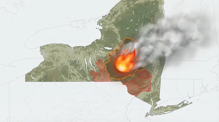 Map of New York showing an active wildfire in central New York with smoke drifting east, highlighted by orange fire boundaries and red shaded evacuation zones.
