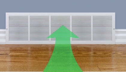 A view of an intake vent with a green arrow indicating air being pulled in.