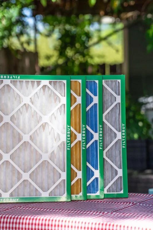 A view of various Ruud air filters displayed on a clean surface.