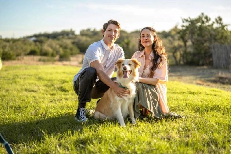 Who Makes HDX Air Filter Replacements - Image of beautiful couple with their dog in the garden.