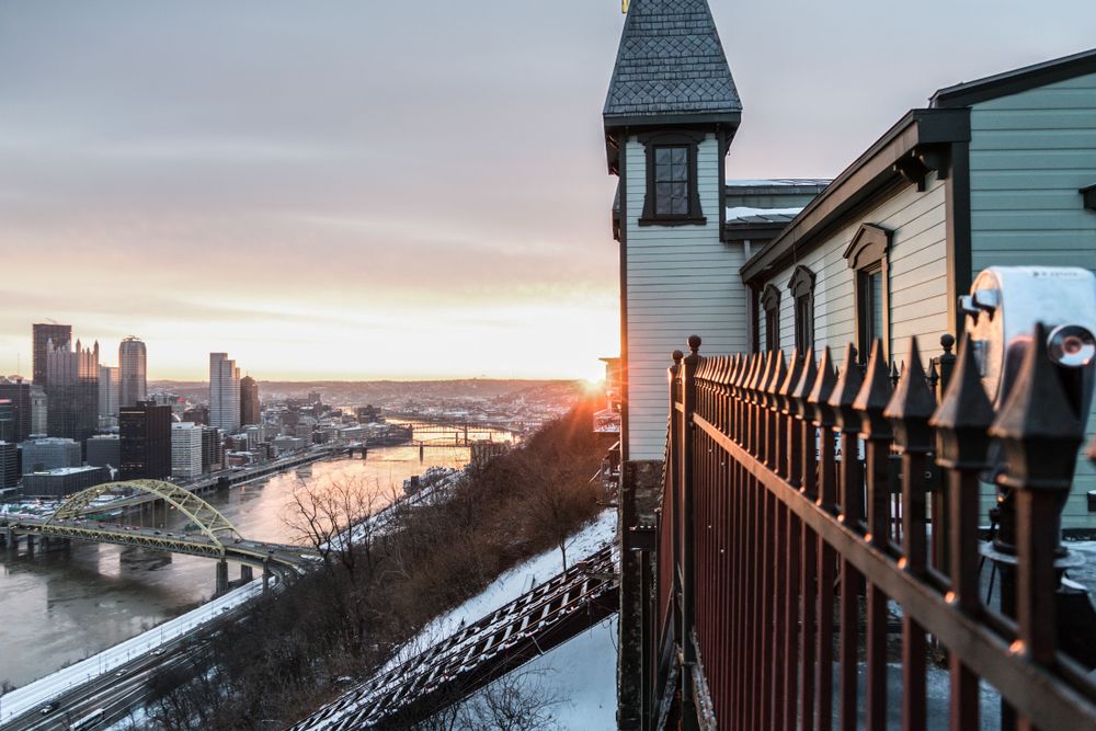 Image of Pittsburgh, PA's residential and business district during winter showing a huge number of the population in need of heating and air conditioning.