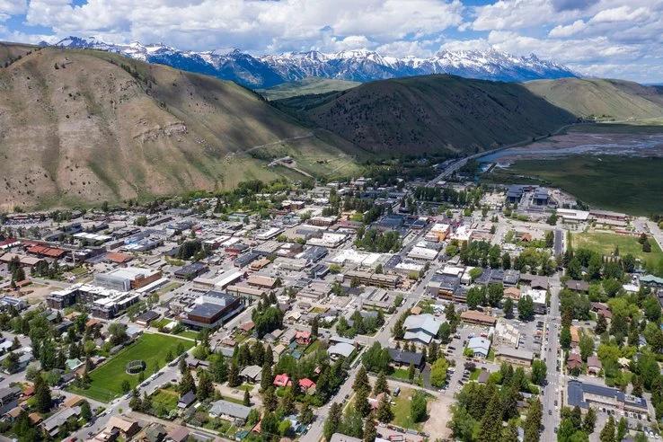View of Jackson, Wyoming framed by Teton mountains, highlighting rural housing pressures and rising eviction risks.