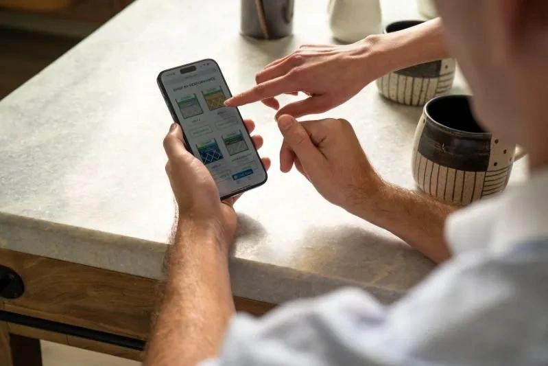 Generalaire Humidifier Air Filter Replacement Manual and How to Use - Image of a couple's hands placing an order for air filters over the phone from Filterbuy.