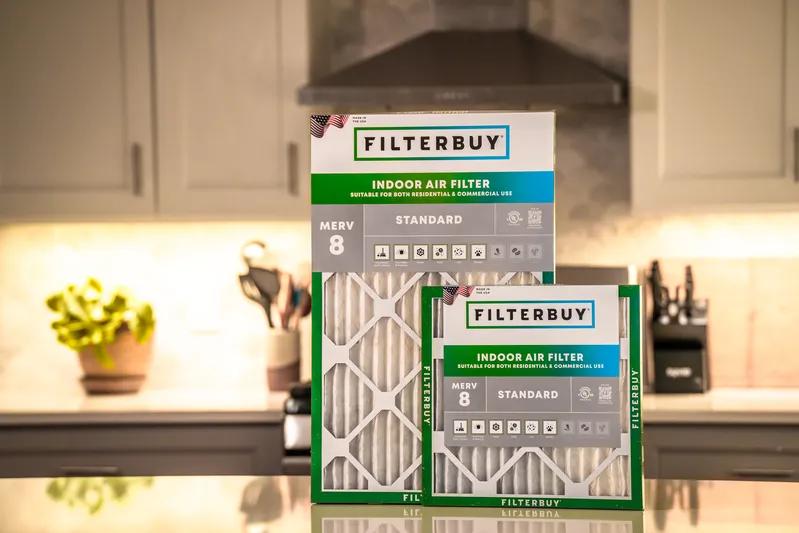A view of two 12x12x4 air filters displayed in a modern kitchen, emphasizing their essential role in improving HVAC system efficiency and indoor air quality.