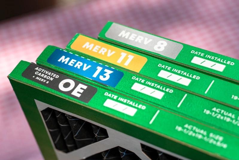 How to Cut a Size-to-Fit AC Air Filter - Image of four MERV air filters with labels, showing MERV 8, MERV 11, MERV 13, and OE (Activated Carbon).