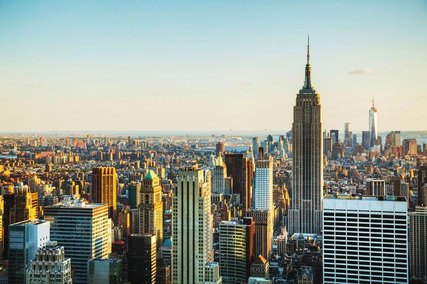 Cities With the Oldest Populations - Infographics of a city with historic architecture and mountain views, offering a peaceful environment for seniors and potentially one of the oldest populations.