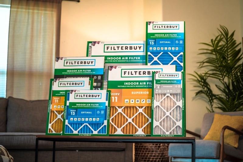 Everything You Need to Know About Foam Air Filter Material for Air Conditioners - Image of a stack of air filters with different MERV ratings from the Filterbuy, displayed on a wooden surface.